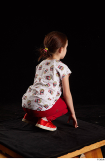 Lilly  1 dressed kneeling red leggings red shoes t…